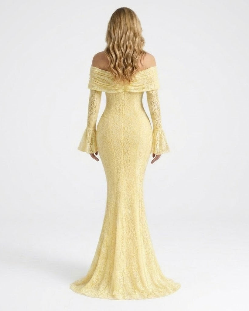 A woman modeling an off-the-shoulder, long-sleeved mermaid-style gown in pale yellow lace, shown from the back against a plain white studio background.