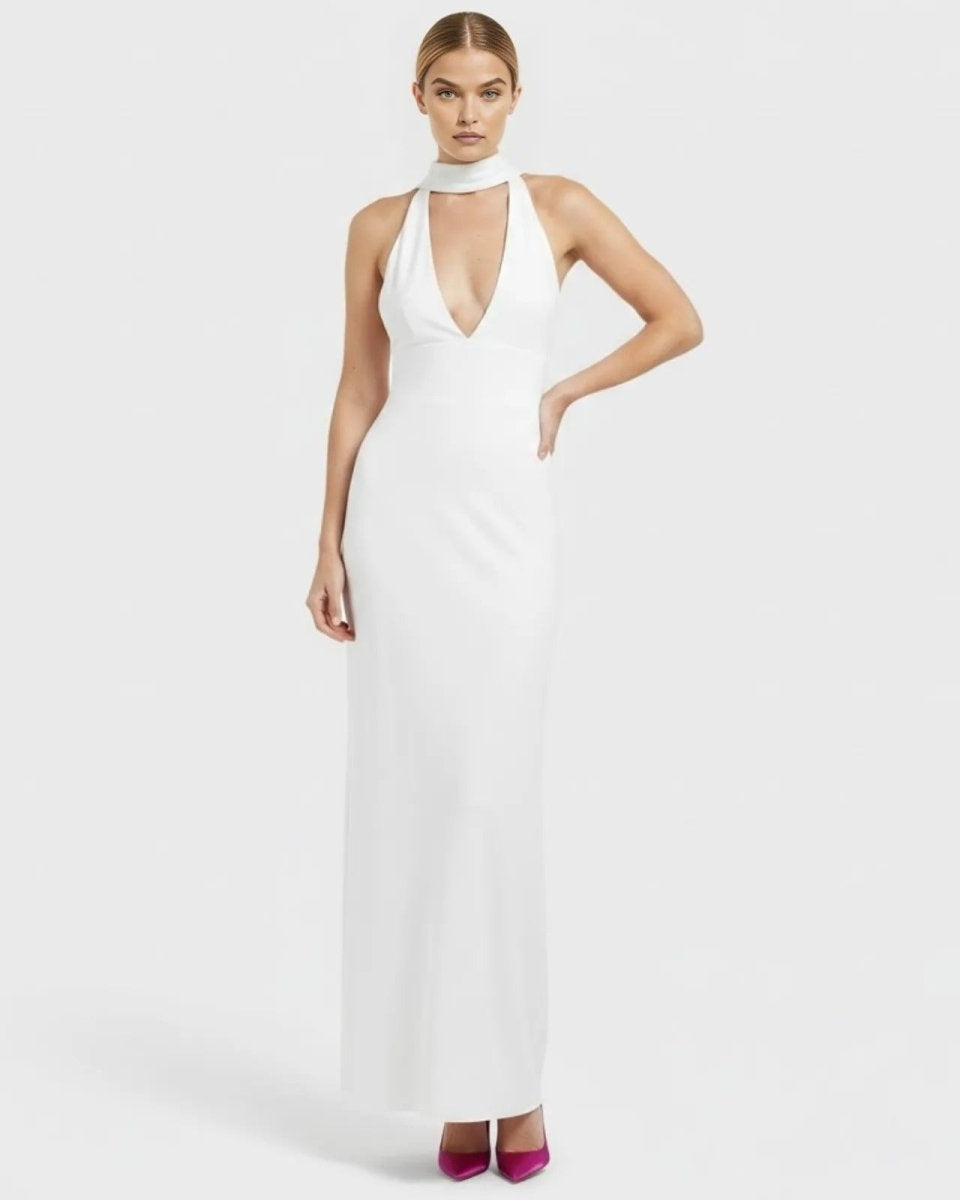 Front view of model wearing Ondara luxury white silk halter gown with choker neck and plunging neckline.