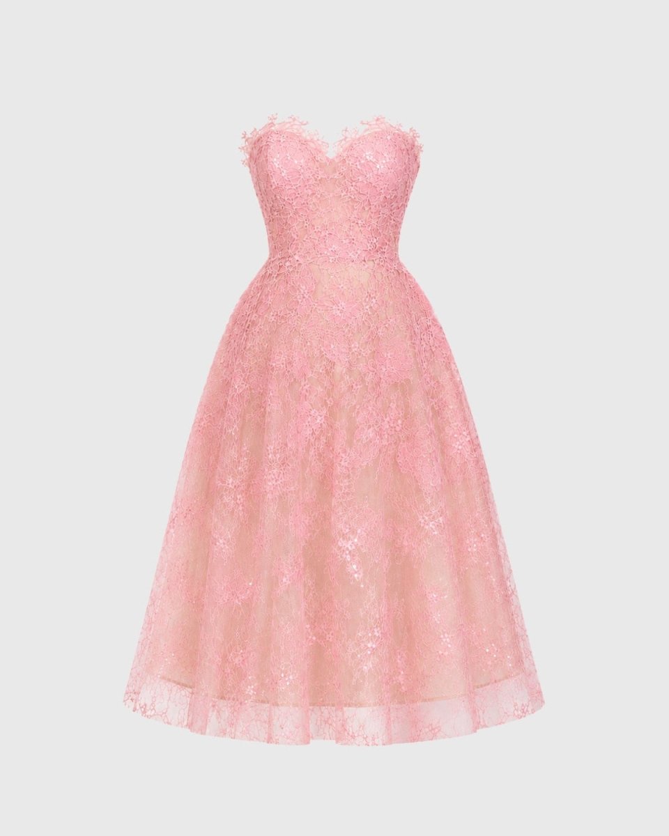 Flatlay product image highlighting the luxury lace sweetheart bodice and delicate sequin detailing of the pink midi dress.