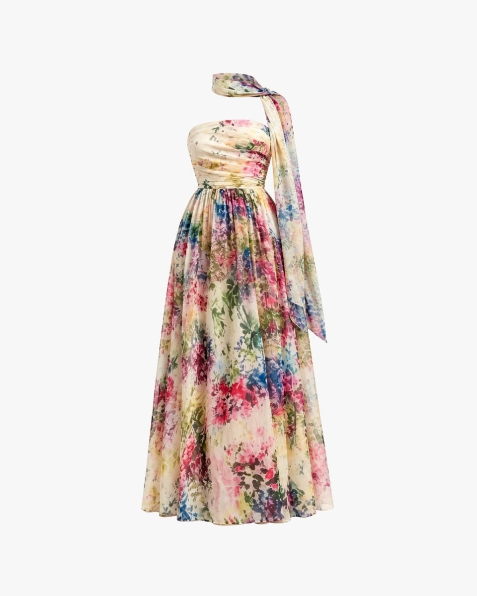 Ghost mannequin front product shots of a flowing romantic watercolor floral gown, highlighting the true-to-life pastel print, waist seam, and sheer scarf accessory.