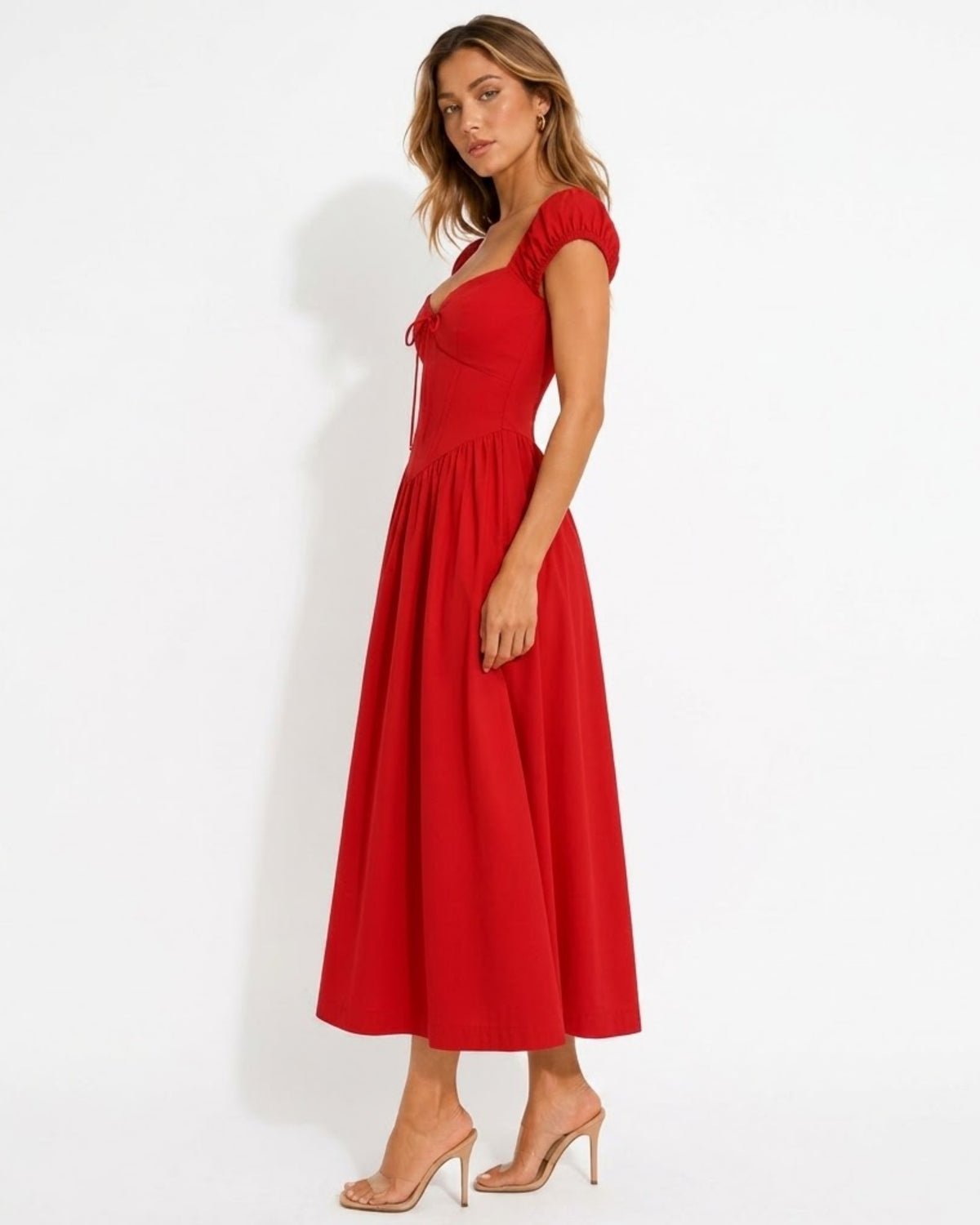 Studio side view of Ondara red pinstripe floral embroidered corset midi dress featuring structured bodice and cap puff sleeves.