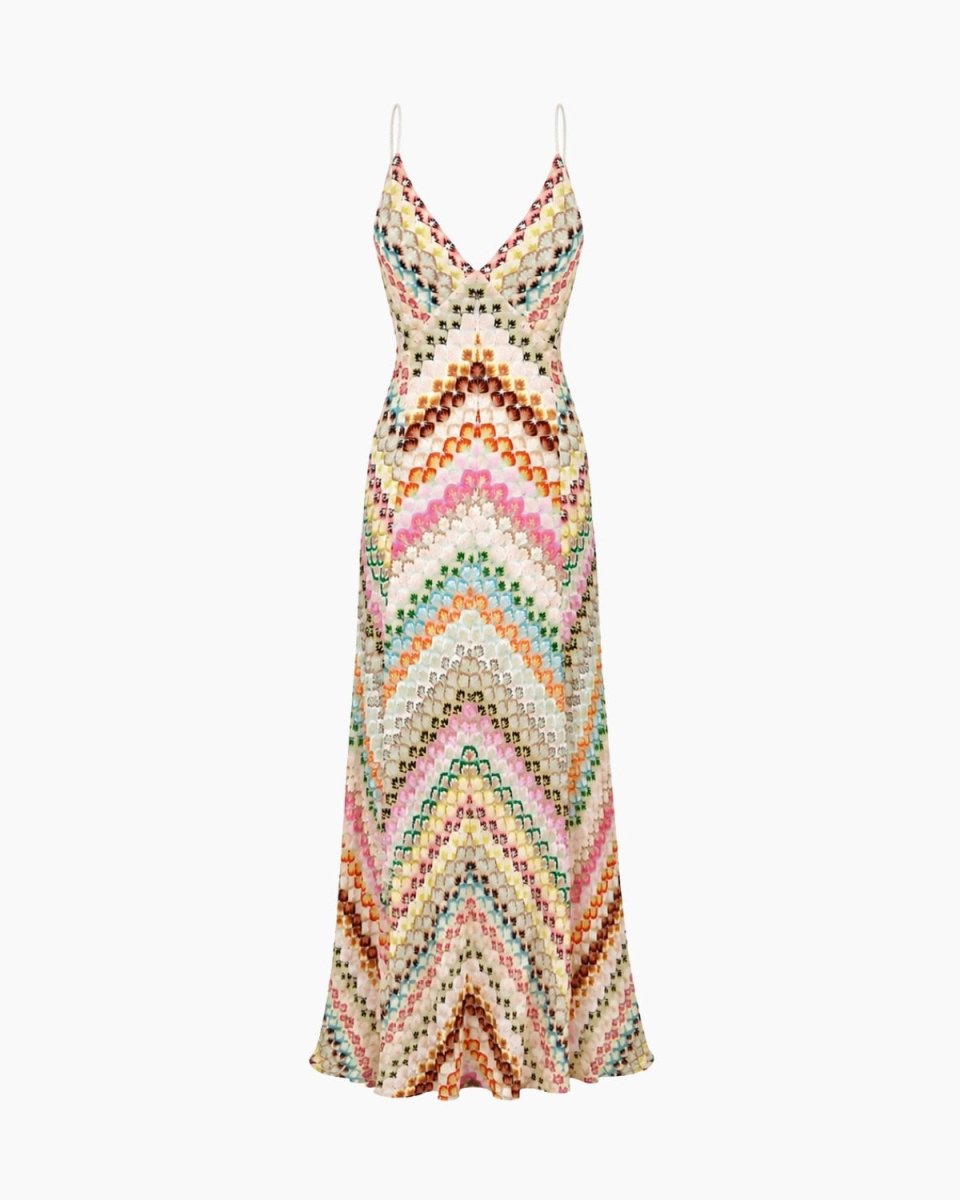 Flat lay studio shot of the Ondara pink multicolor chevron knit V-neck maxi dress.