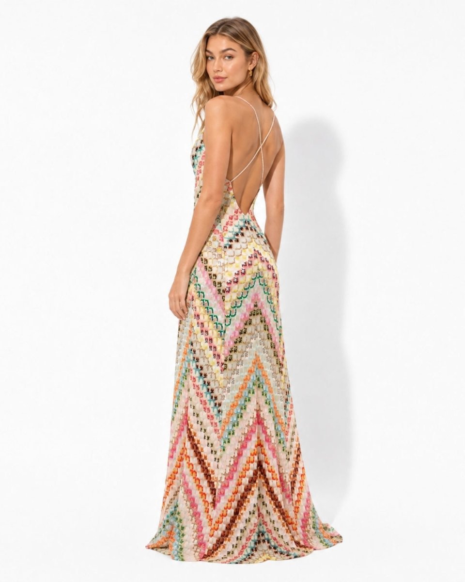 Elegant back view of the pink multicolor zigzag knit open back maxi dress highlighting the thin halter ties.
