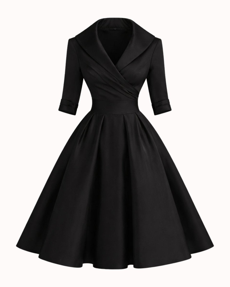A black 1950s-style swing dress with a wrap-style V-neckline, three-quarter sleeves, and a flared skirt, shown against a plain white background.
