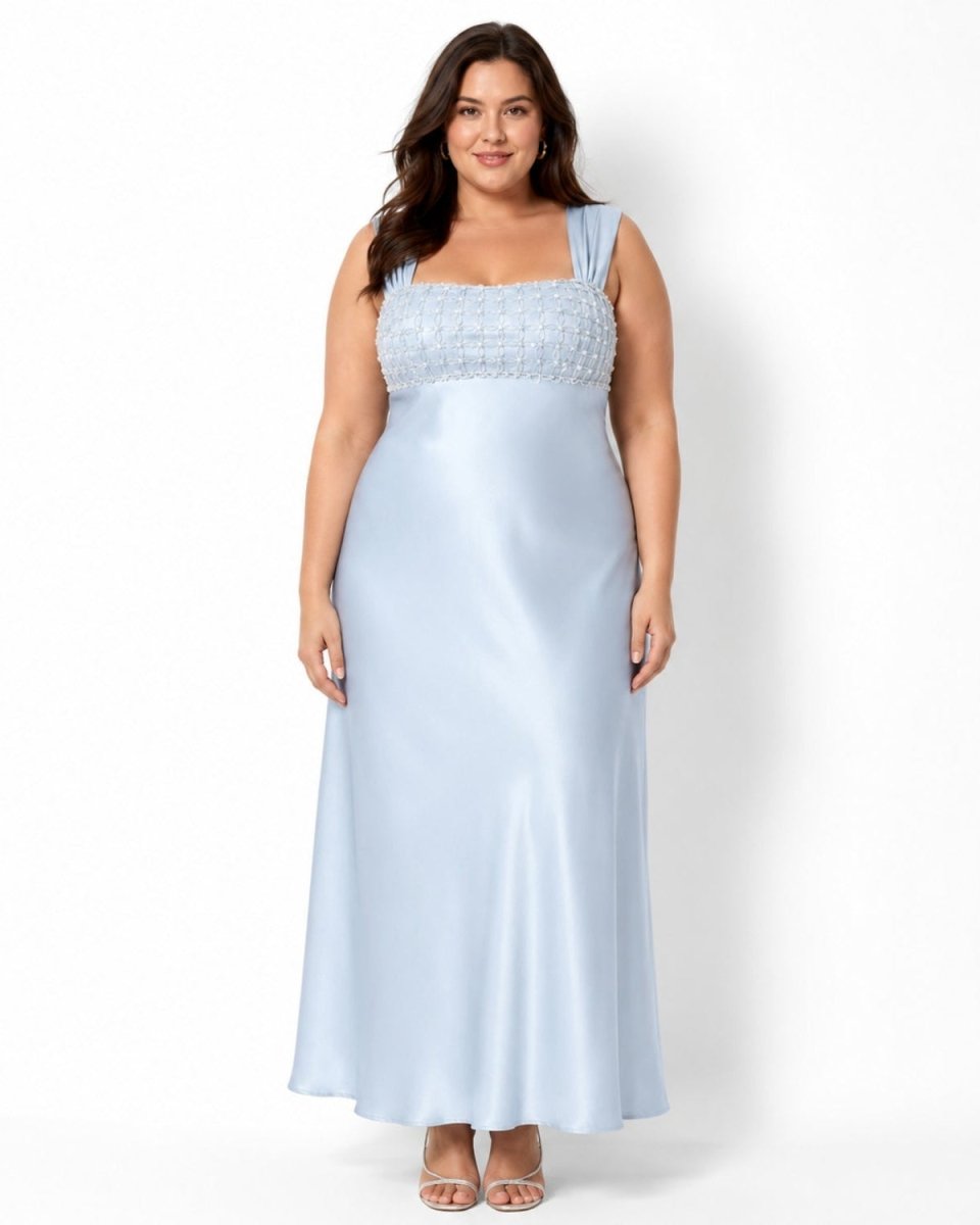 Plus size model wearing the Ondara ice blue satin beaded square neck evening gown, demonstrating the flawless fit and smoothing drape of the luxury satin fabric.