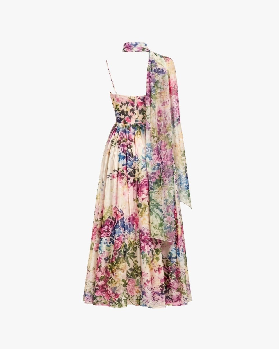 Ghost mannequin back product shots of a flowing romantic watercolor floral gown, highlighting the true-to-life pastel print, waist seam, and sheer scarf accessory.