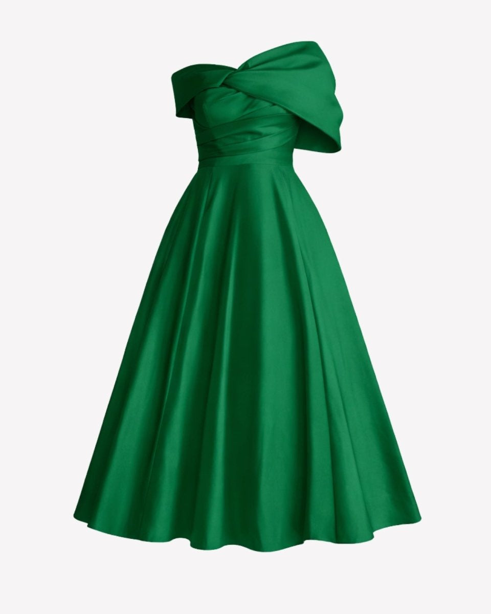 Product flat lay of emerald green satin off-shoulder A-line cocktail dress.