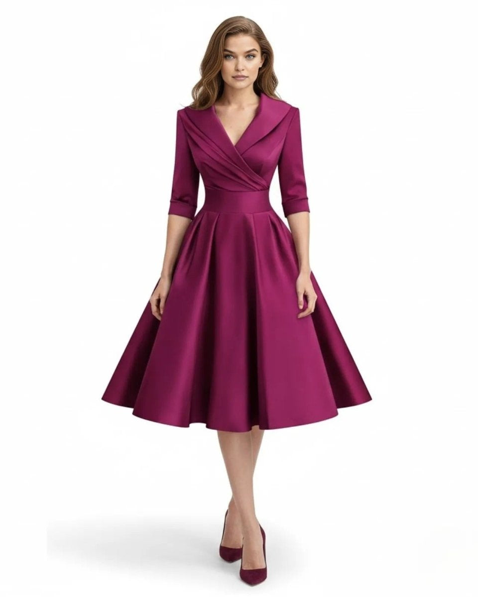 Woman wearing a purple dress on a white background