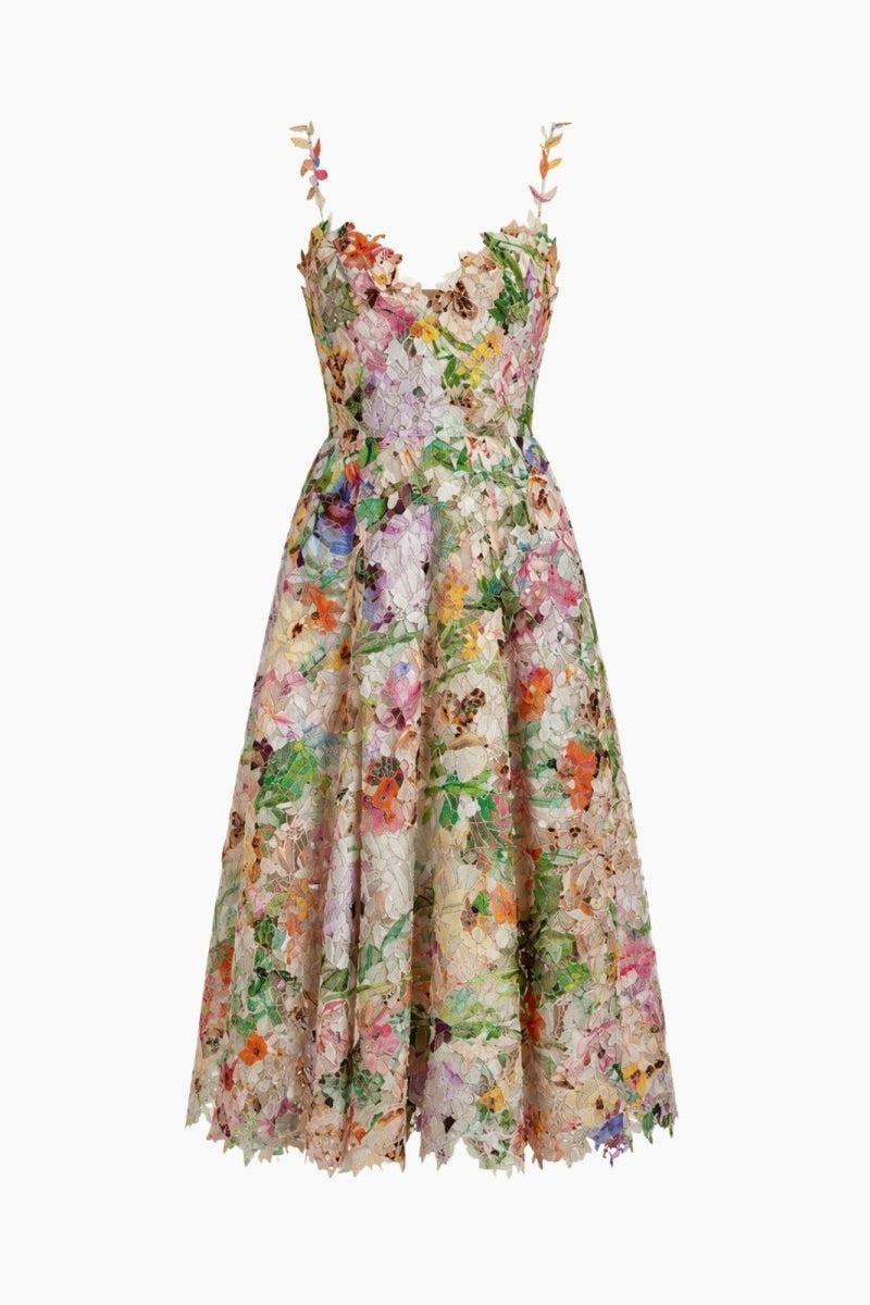 Close-up detail of hand-crafted 3D botanical appliques and pastel lace fabric on Ondara dress
