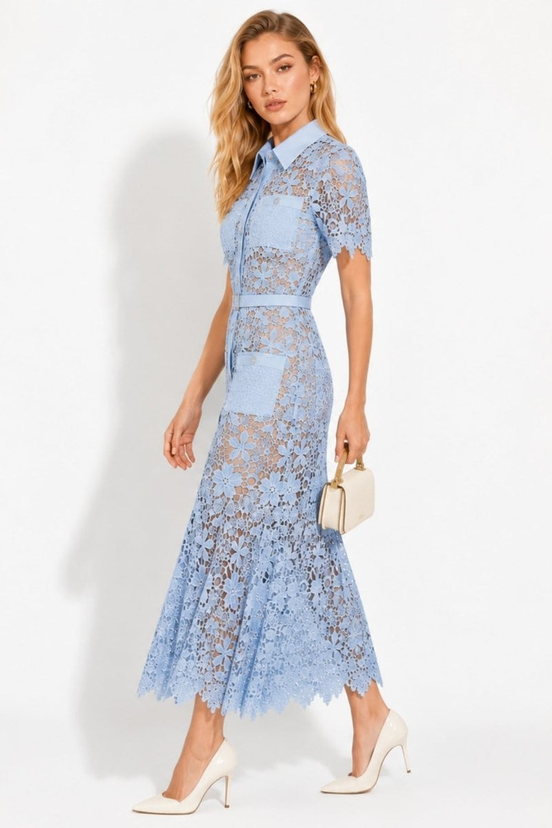 Side profile view of Ondara light blue lace shirt midi dress with matching belt and hand in pocket