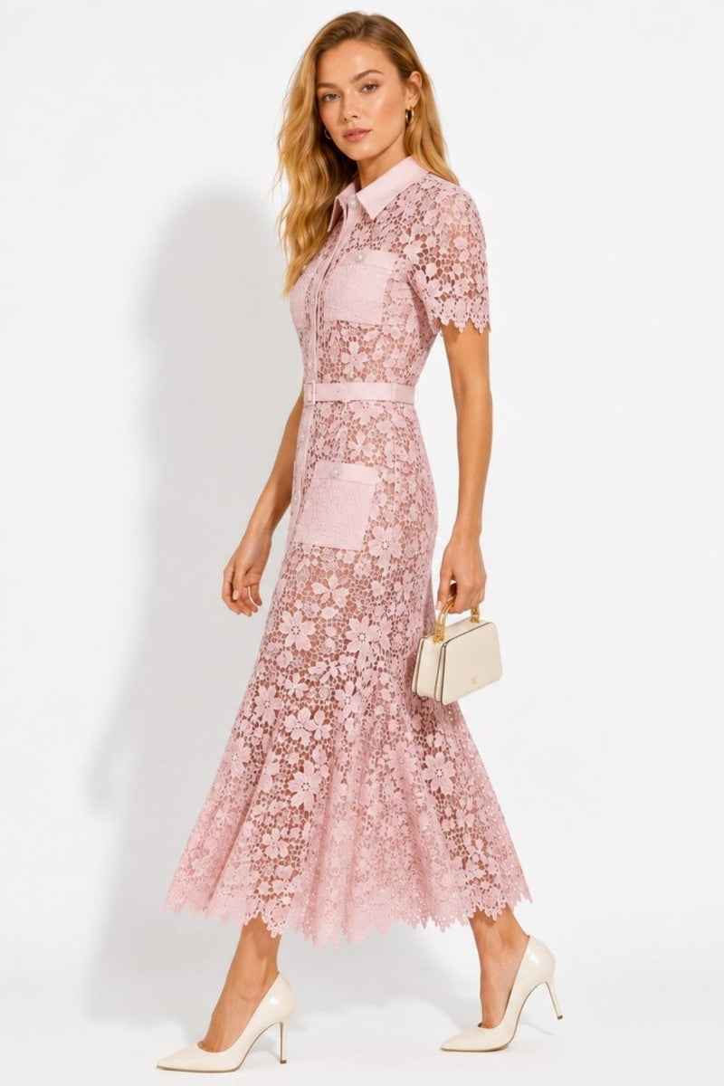 Side angle view of Ondara pink guipure lace midi dress highlighting structured pockets and waist belt