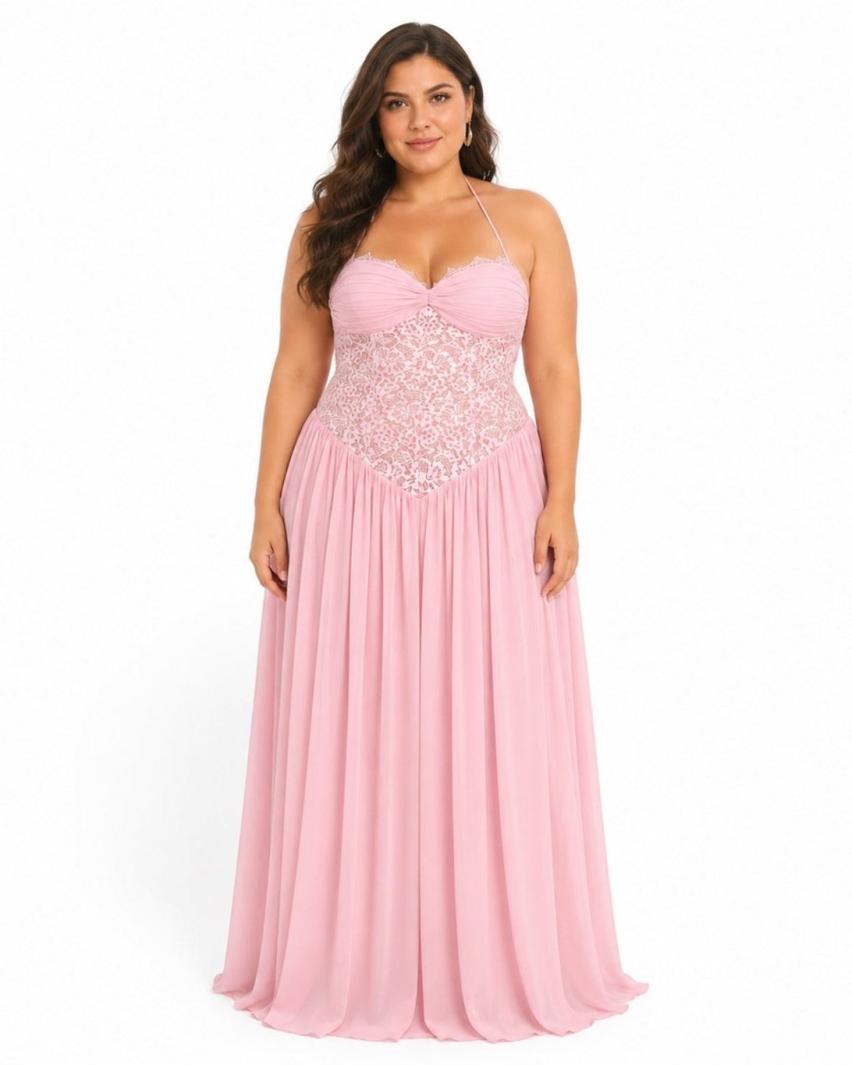  Plus size pastel pink fairycore bridesmaid evening gown by Ondara, showcasing a flattering drop-waist lace corset and halter neck on a curvy model.