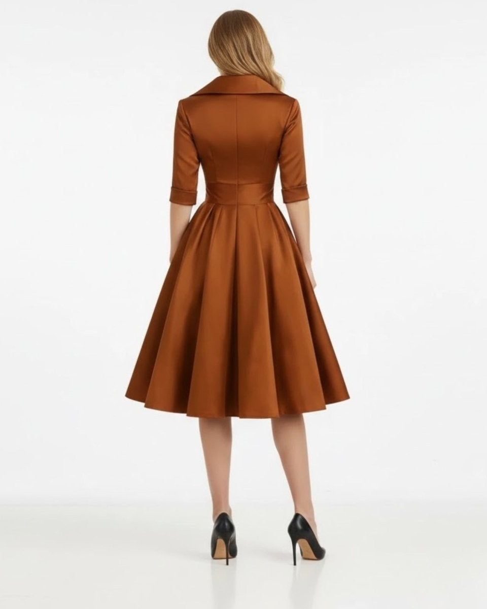 Brown dress worn by a model on a white background