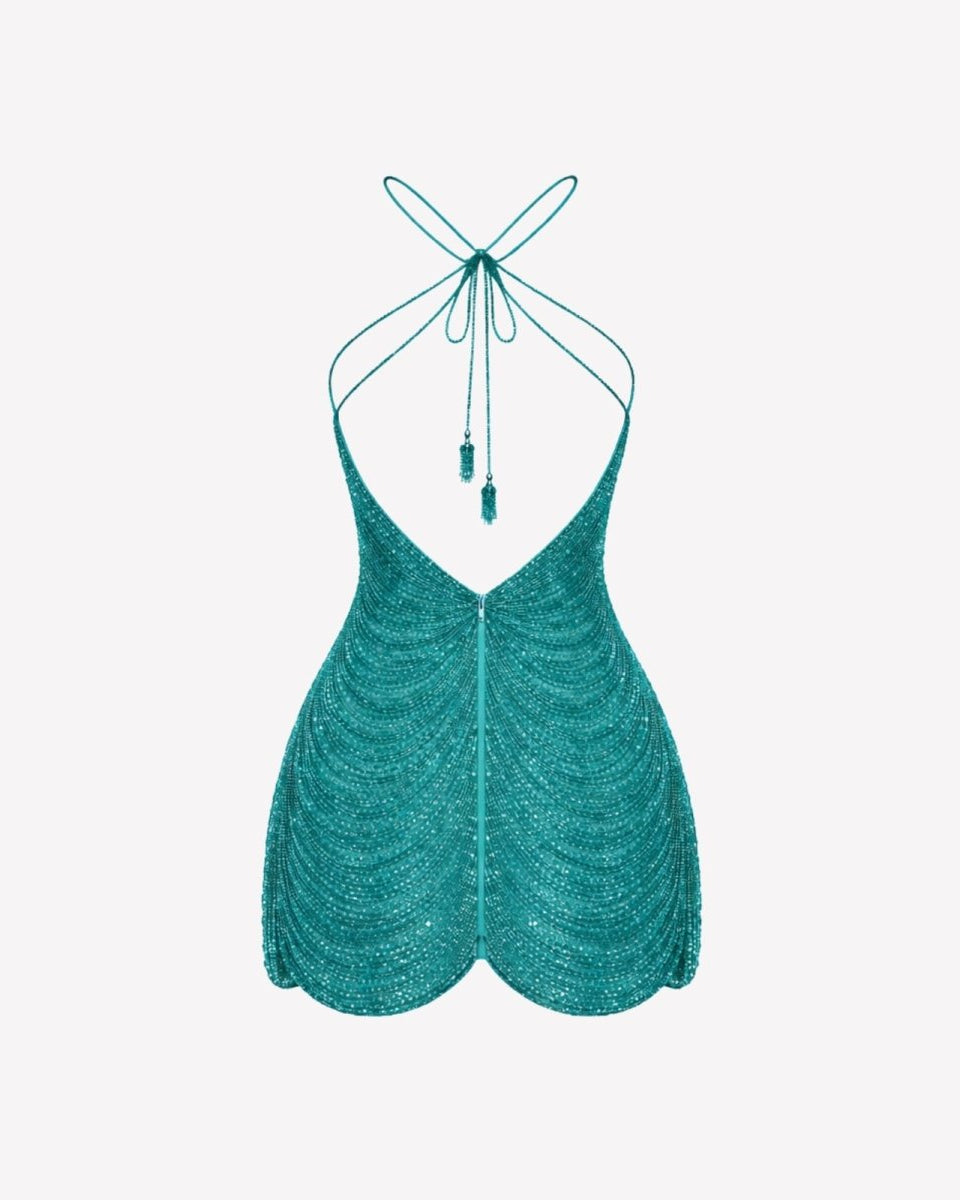 Front product view of Ondara teal glass-beaded backless mini dress showing intricate heavy beadwork.