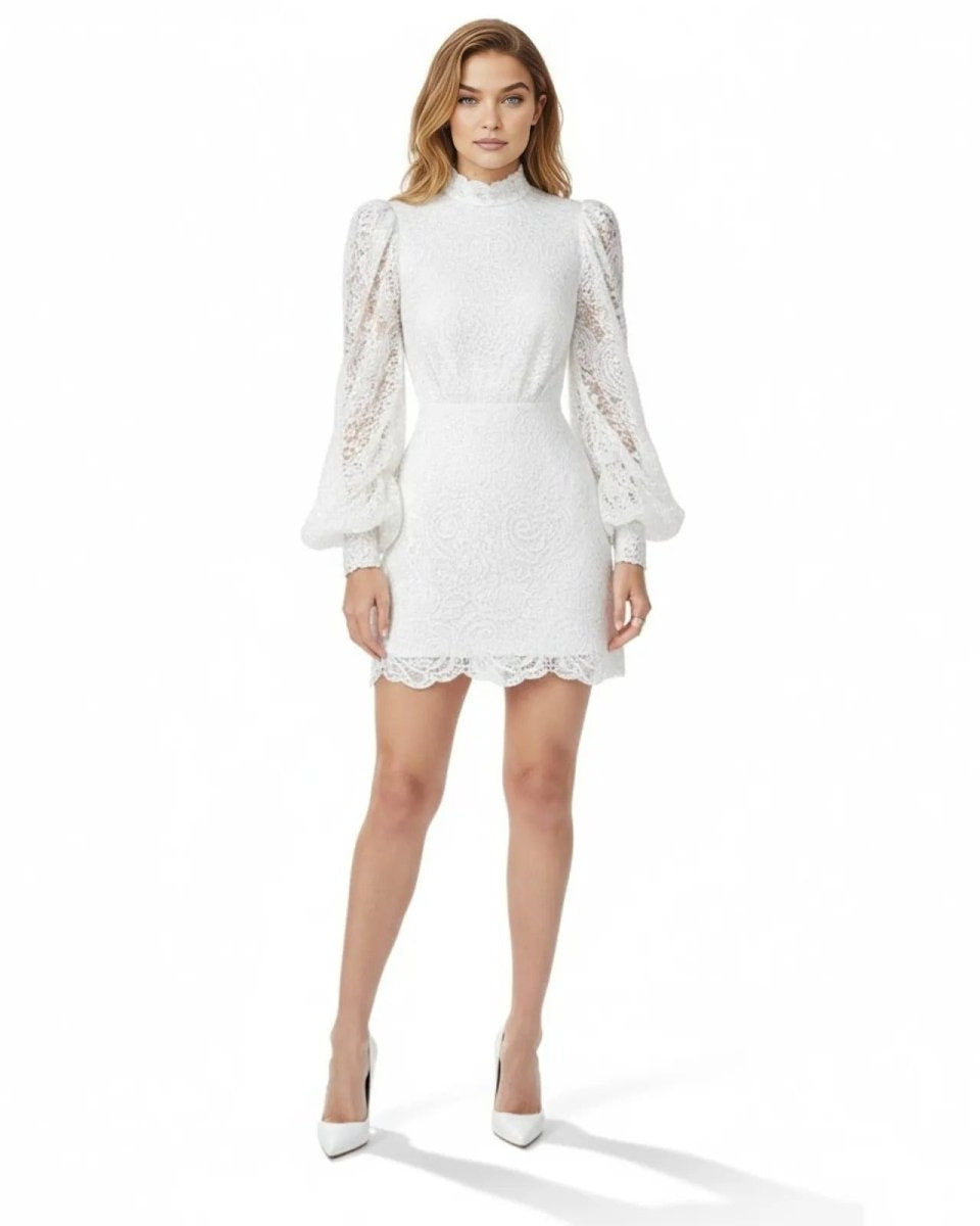 Woman wearing a white lace dress on a white background