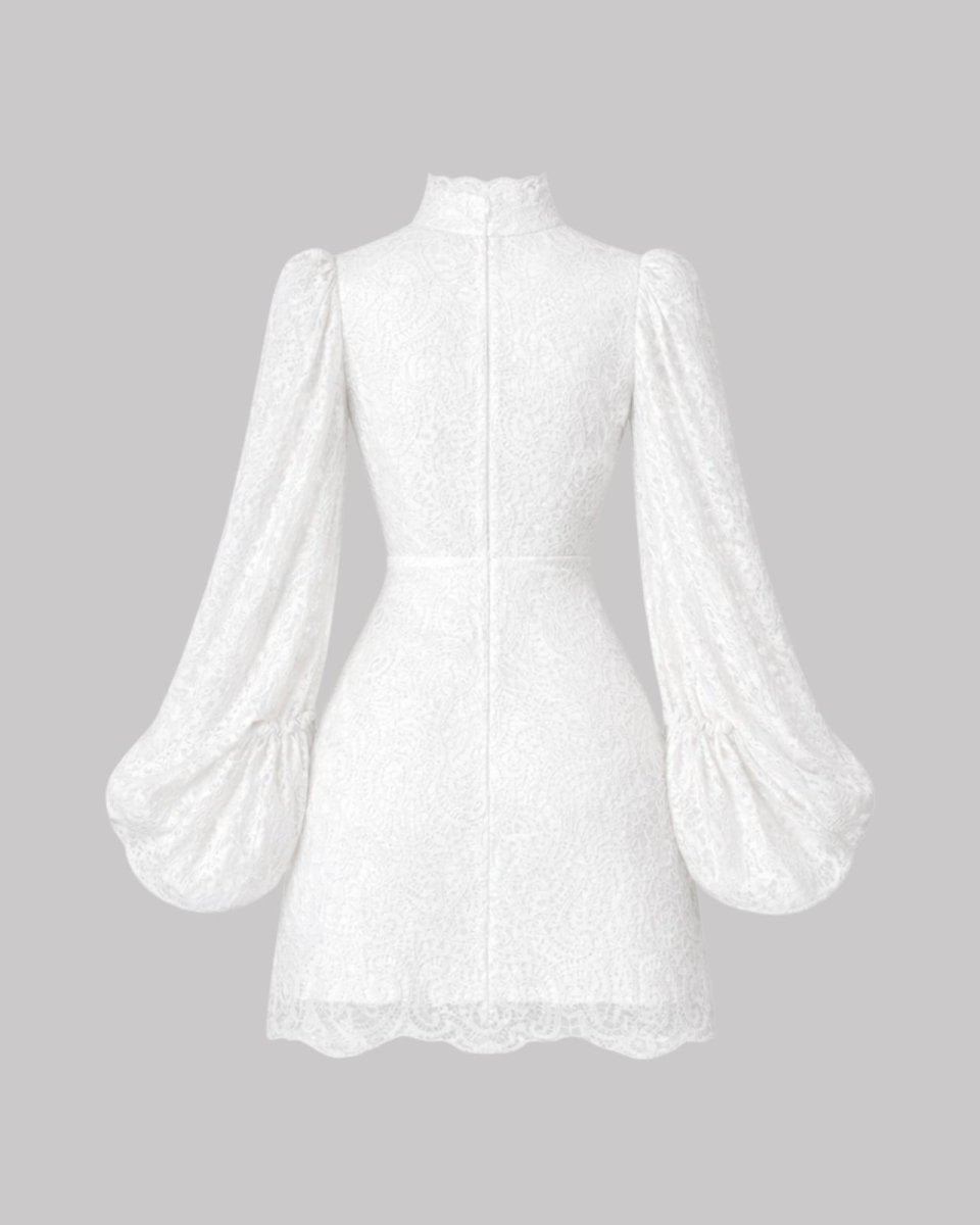 White lace blouse with puffed sleeves on a gray background