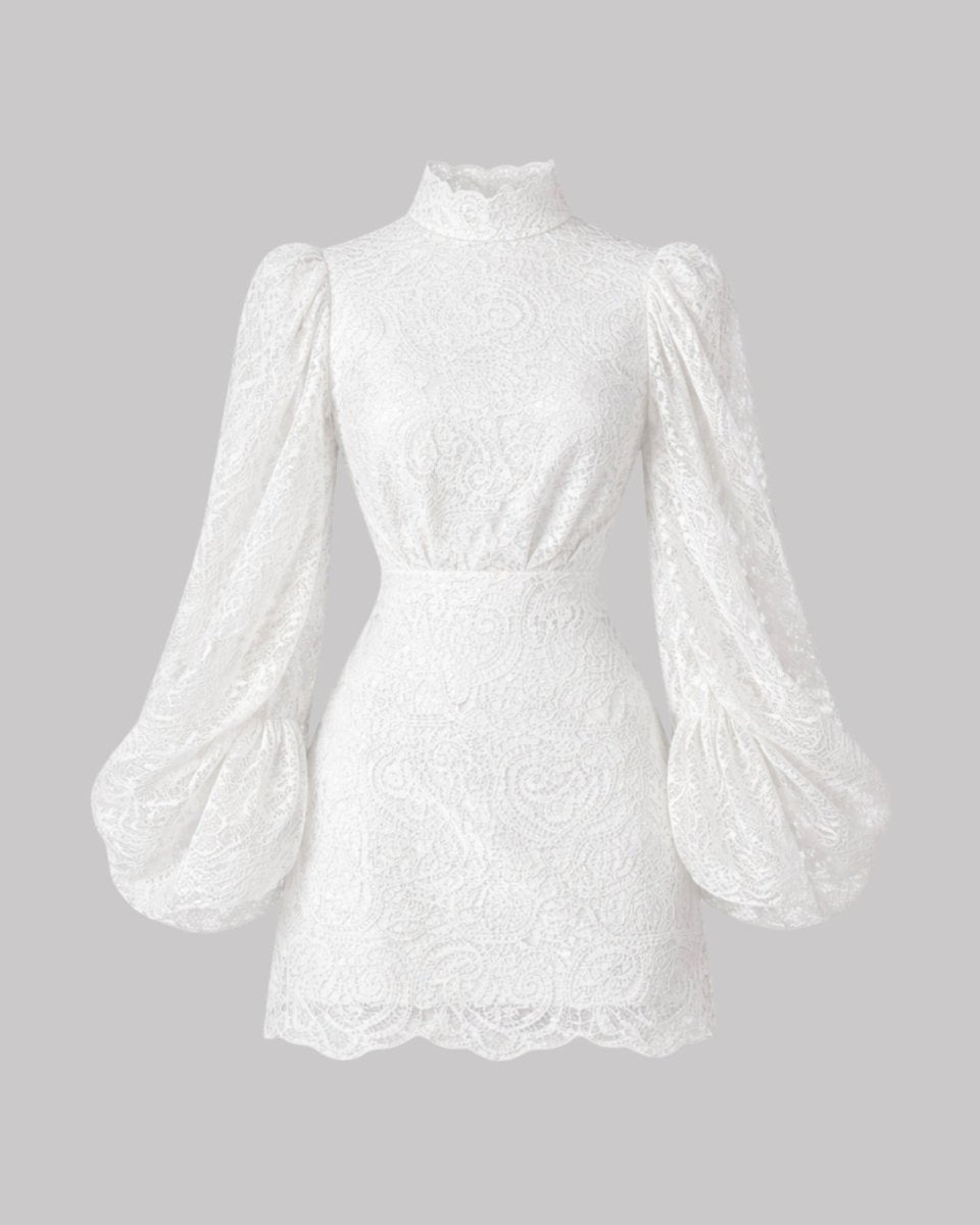 White lace blouse with puff sleeves on a gray background