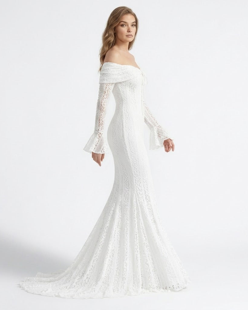 An off-the-shoulder white lace wedding gown with long flared sleeves and a mermaid-style fitted silhouette, shown on a model against a clean white studio background.