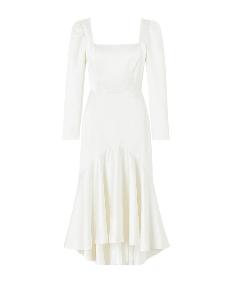 White dress with long sleeves on a white background
