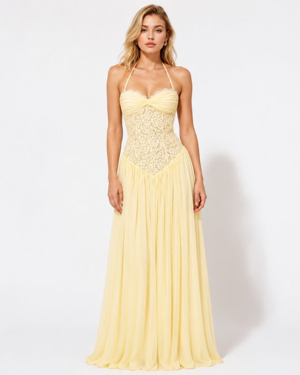 Pastel yellow bustier halter prom dress by Ondara featuring a sheer lace basque waist corset and floor-length pleated chiffon skirt.