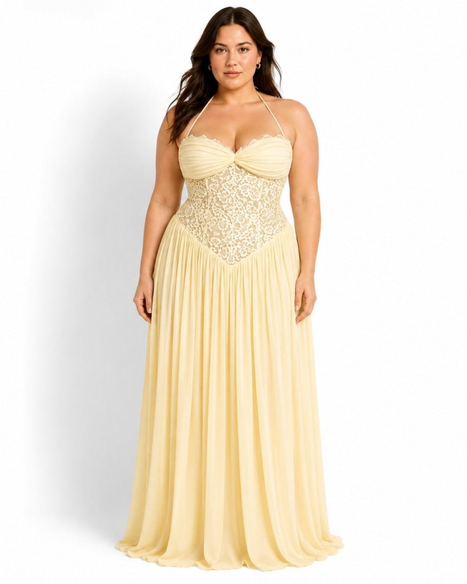 Curvy model wearing the Ondara pastel yellow bustier halter prom dress, illustrating the supportive lace corset and romantic gathered sweetheart bust.